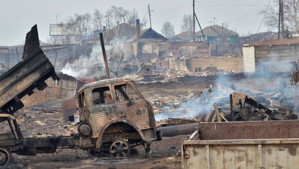 Последствия природных пожаров в селе Знаменка Республики Хакасия. Архивное фото