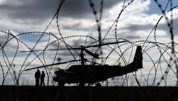 Вертолет на военном аэродроме. Архивное фото
