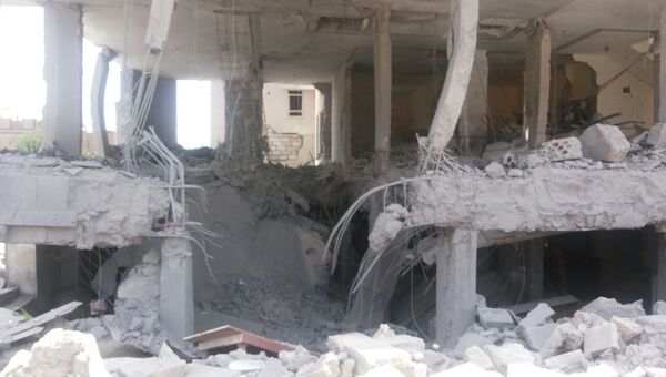 Разрушеное здание в Сане, Йемен