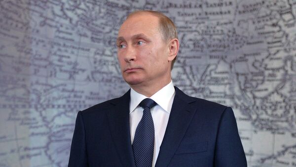Президент России Владимир Путин во время заседания попечительского совета Русского географического общества в Санкт-Петербурге. Архивное фото