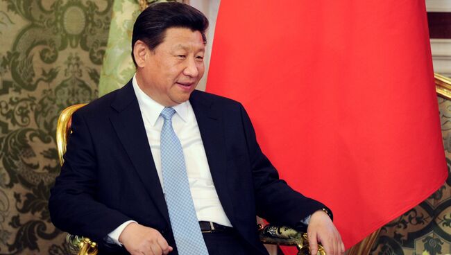 Председатель Китайской Народной Республики Си Цзиньпин во время беседы с президентом России Владимиром Путиным в Кремлёвском дворце