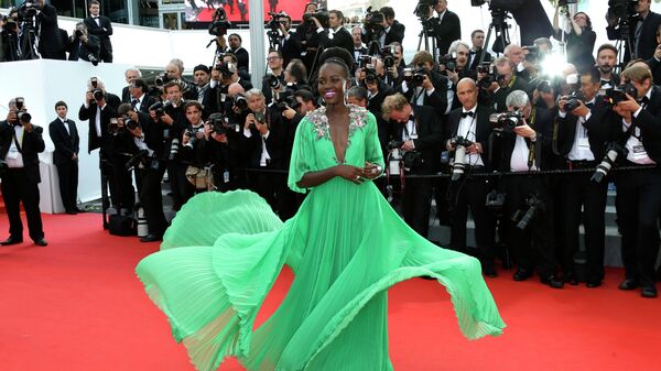 Кенийская актриса Люпита Нионго на церемонии открытия на 68-й международный кинофестиваль в Каннах