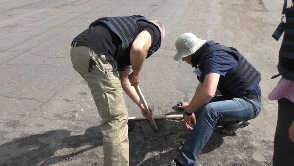 Наблюдатели ОБСЕ изучили каждую воронку и яму в Горловке после обстрела