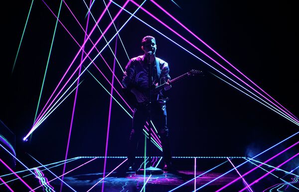 Американский певец Ник Джонас выступает на церемонии вручения премии Billboard Music Awards. 17 мая 2015