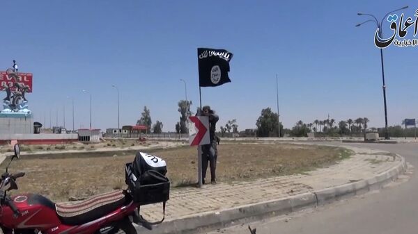 Боевики ИГ на улице Эр-Рамади в провинции Анбар, Ирак