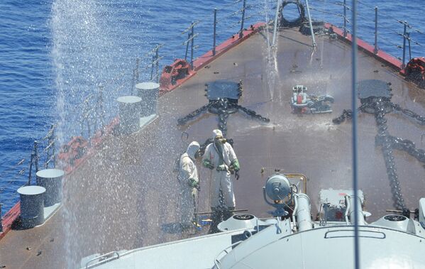 Учения по противохимической защите на гвардейском ракетном крейсере (ГРКР) Москва во время совместных военных учений России и Китая в Средиземном море Морское взаимодействие 2015