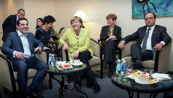 Алексис Ципрас, Ангела Меркель и Франсуа Олланд. Архивное фото