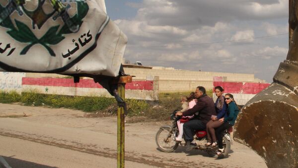 Бюст бывшего президента Хафеза Асада на блокпосту на въезде в город Хомс