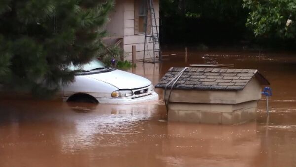 Затопленные дома и дороги – последствия наводнения в США после мощных ливней