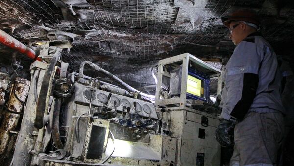 Работник участка подземного бурения на шахте имени С.М. Кирова