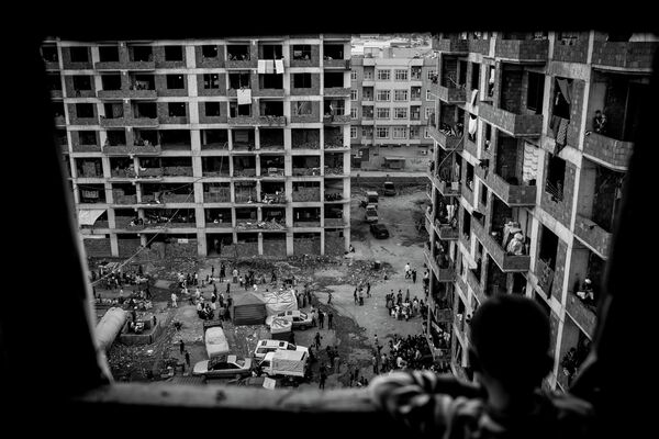 Фотография из серии Поселения беженцев-езидов, спасающихся от геноцида в Синджаре в августе 2014 г. (г. Захо, Ирак) фотографа Кристиана Вернера (Германия), представленная на Международном конкурсе фотожурналистики имени Андрея Стенина