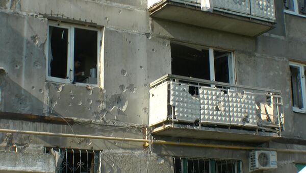 Горловка и Донецк после обстрелов: поврежденные дома и выбитые окна
