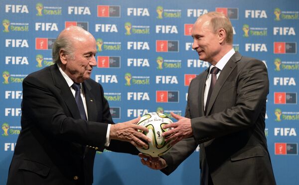 Президент России Владимир Путин и президент Международной федерации футбола (ФИФА) Йозеф Блаттер