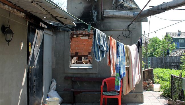 Жилой дом, разрушенный в результате обстрела Октябрьского района города Донецка Жилой дом, разрушенный в результате обстрела Октябрьского района города Донецка