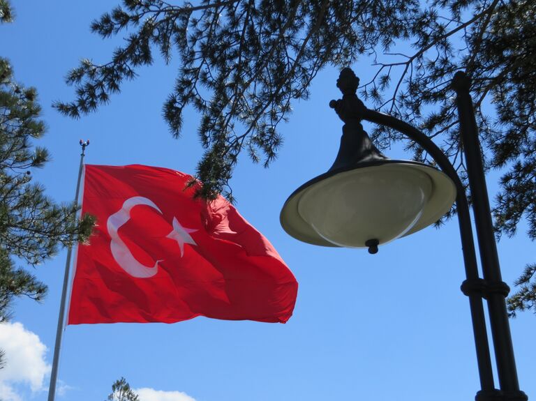 Флаг Турции. Архивное фото Флаг Турции. Архивное фото