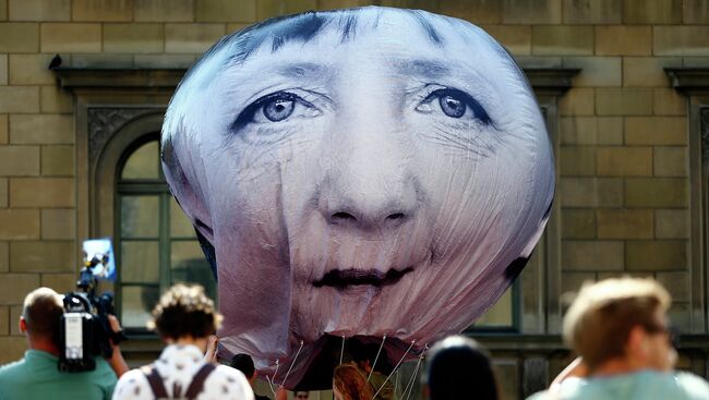 Акция протеста против саммита G7 в Мюнхене. Июнь 2015. Архивное фото