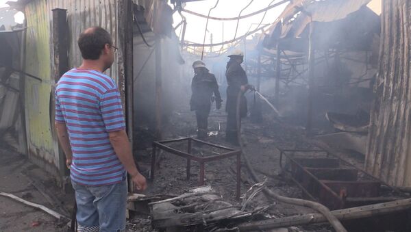 Пепелище на месте рынка и поврежденные дома: последствия обстрелов Донецка