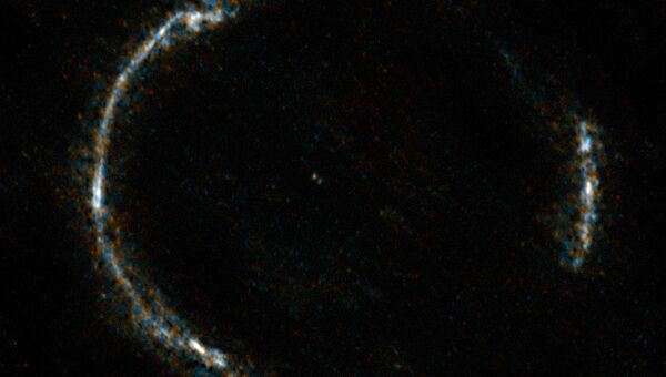 Композитный снимок галактики SDP.81, полученный телескопом ALMA