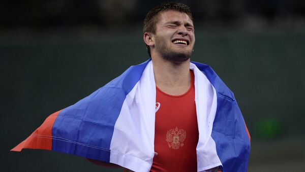 Давид Чакветадзе (Россия) радуется победе в финальном поединке против Жана Беленюка (Украина) на Играх в Баку