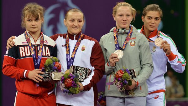 Призеры соревнований среди женщин по вольной борьбе в весовой категории до 60 кг на I Европейских играх в Баку