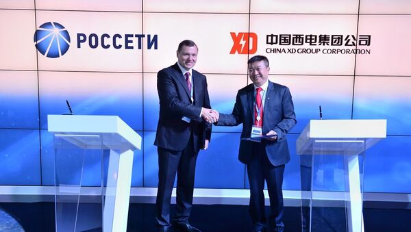 Олег Бударгин и Жанг Ялин (XD China Group) на подписании соглашения. Архивное фото