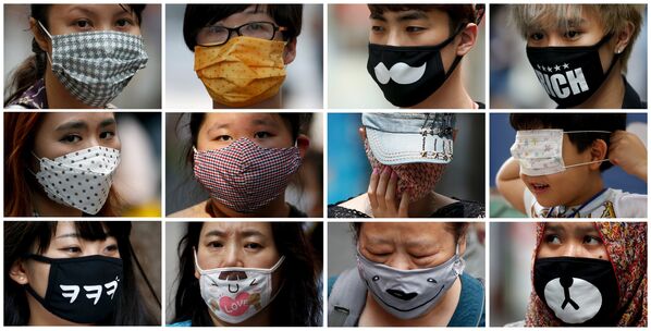 Люди с масками на улицах Сеула