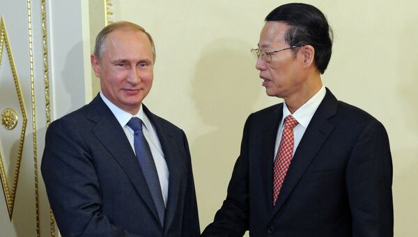 Президент России Владимир Путин и вице-премьер госсовета КНР Чжан Гаоли. Архивное фото
