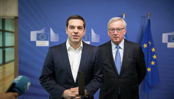 Встреча премьер-министра Греции Алексиса Ципраса и председателя Еврокомиссии Жан-Клода Юнкера. Архивное фото