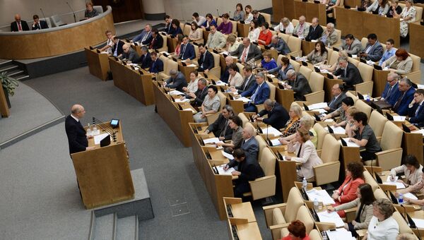 Министр финансов РФ Антон Силуанов выступает на парламентских слушаниях в Государственной Думе РФ