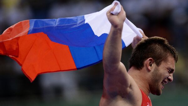 Давит Чакветадзе (Россия) радуется победе на соревнованиях по греко-римской борьбе. Архивное фото