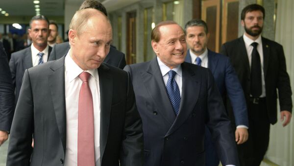 Президент России Владимир Путин и экс-премьер Италии Сильвио Берлускони. Архивное фото