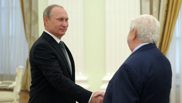 Президент России Владимир Путин и министр иностранных дел Сирии Валид Муаллем во время встречи в Кремле
