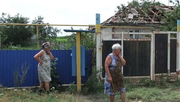 Последствия обстрела села Саханка в Донецкой области