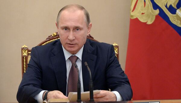 Президент России Владимир Путин на заседании Совета безопасности РФ в Кремле. Архивное фото