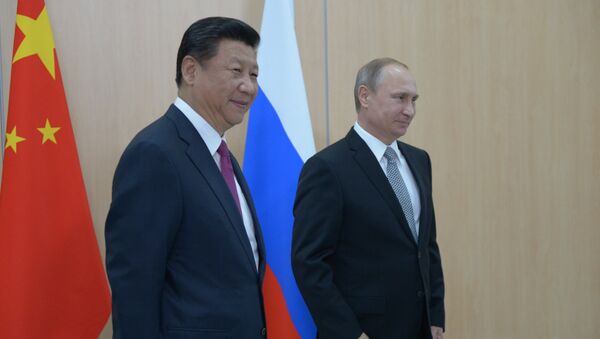 Президент Российской Федерации Владимир Путин и Председатель Китайской Народной Республики Си Цзиньпин во время встречи в Уфе