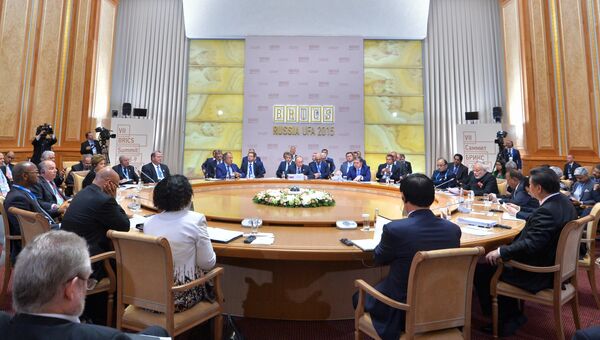 Президент Российской Федерации Владимир Путин во время встречи лидеров БРИКС в расширенном составе