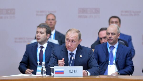 Президент Российской Федерации Владимир Путин во время встречи лидеров БРИКС в расширенном составе