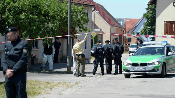 Полиция на месте преступления в пригороде Ансбаха, Германия