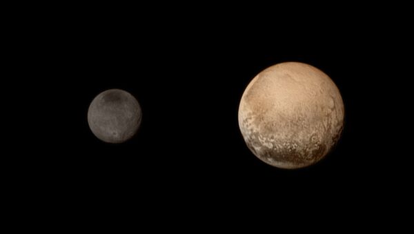 Новый цветной портрет пары Плутона и Харона. Архивное фото