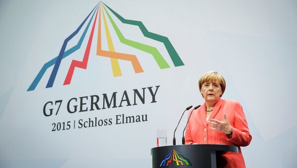Канцлер Германии Ангела Меркель выступает на заключительной пресс-конференции саммита большой семерки. Архивное фото