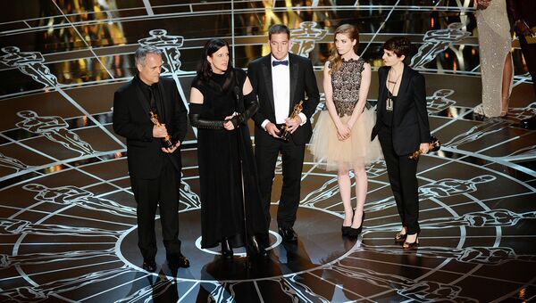 Американская журналистка, кинопродюсер, кинооператор, кинорежиссёр Лора Пойтрас во время вручения премии Оскар. Архивное фото