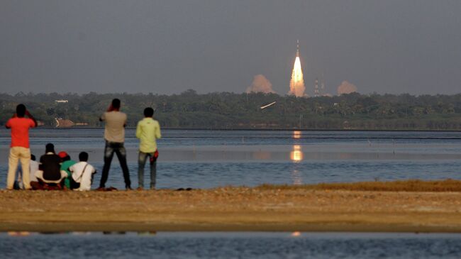 Запуск ракеты-носителя с индийским навигационным спутником IRNSS-1D с космодрома на острове Шрихарикота. Архивное фото