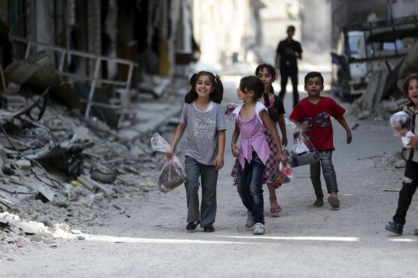 Дети в оккупированном боевиками пригороде Дамаска