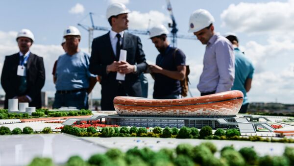 Макет стадиона Мордовия Арена, строящегося в Саранске для проведения матчей чемпионата мира по футболу 2018 года
