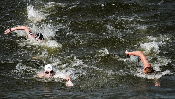 Ферри Вертман, Спиридон Гианниотис и Маттиас Швайнцер на дистанции 10 км на открытой воде. Архивное фото