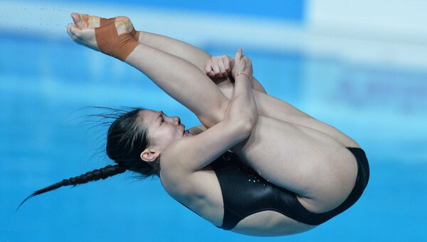 Хэ Цзы (КНР) в финале соревнований по прыжкам в воду с трамплина 3 м