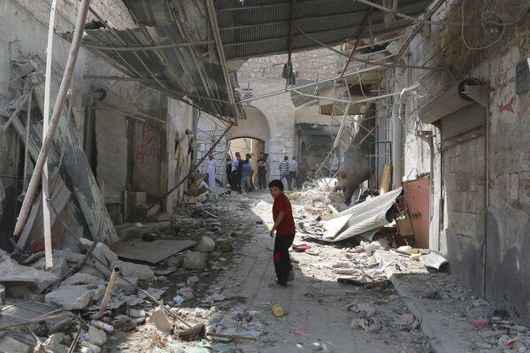 Место падения истребителя сирийской армии в жилом районе города Эриха