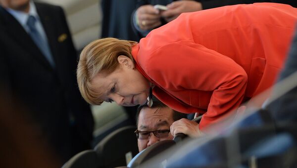Канцлер Германии Ангела Меркель перед финальным матчем чемпионата мира по футболу