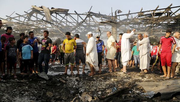 Последствия взрыва на рынке Багдада