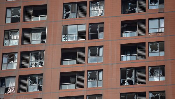 Разрушенные здания в результате взрывов на складе опасных веществ в промышленном городе Тяньцзине в Китае